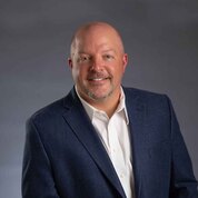 A portrait photo of doctor Jonathan Sanderson, a dentist in Magnolia